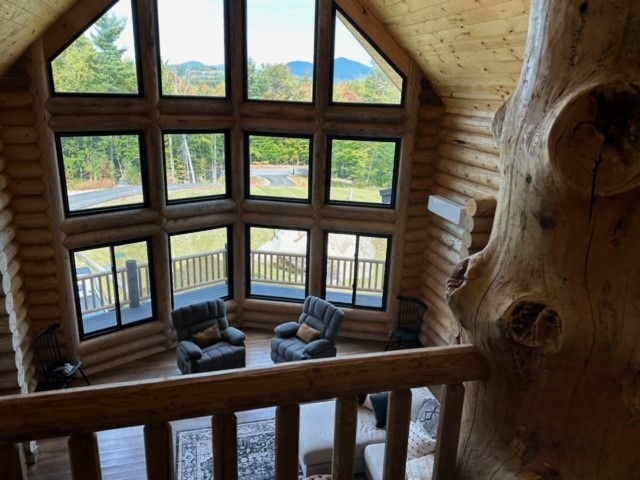Log Home living room from the loft BED