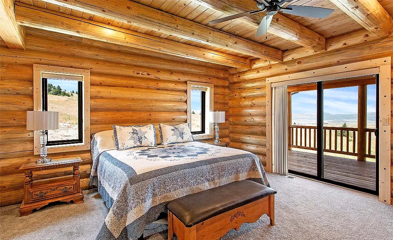 log home master bedroom design